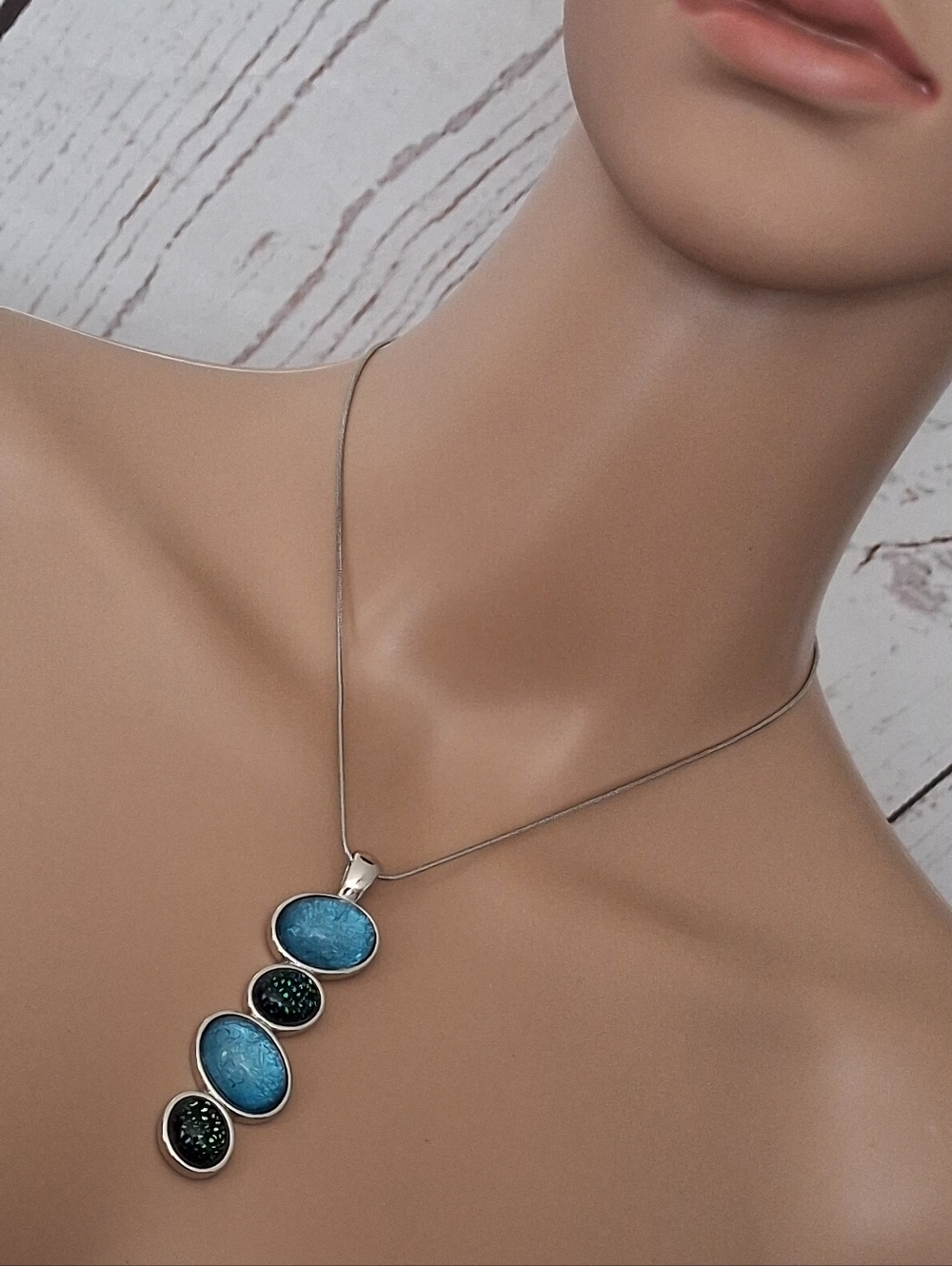 Lia Sophia Silvertone Pendant Necklace with Blue and Teal Cabochon Stones